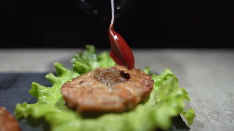 The process of making a delicious hamburger or cheeseburger. close-up Chef's Stock Footage 152582227