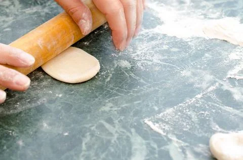 The process of making delicious home-made dumplings with meat. Stock Photos