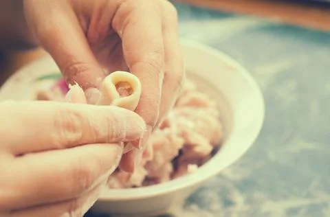 The process of making delicious home-made dumplings with meat. Stock Photos