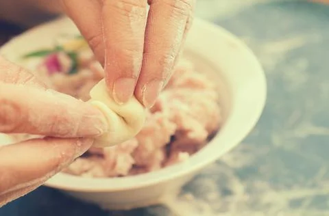 The process of making delicious home-made dumplings with meat. Stock Photos