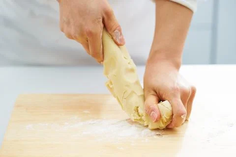 The process of making dough by hand Stock Photos