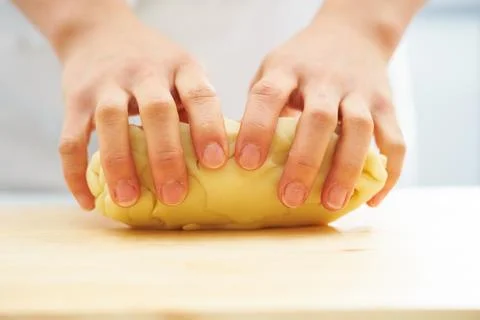 The process of making dough by hand Stock Photos