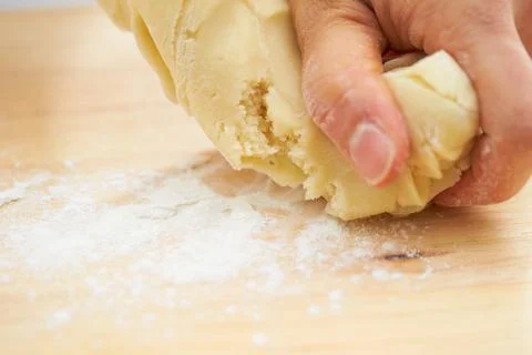 The process of making dough by hand Stock Photos