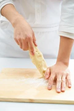 The process of making dough by hand Foto stock
