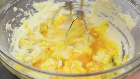 Process of making dough. Mixing ingredients with kitchen mixer in glass bowl. Stock Footage 154937804