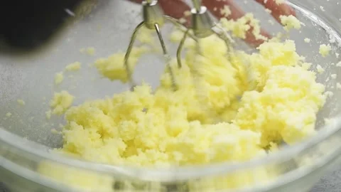 Process of making dough. Mixing ingredients with kitchen mixer in glass bowl. Stock Footage 161016826