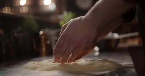 Process of the making the dough for Neapolitan pizza in the pizzeria restaurant Stock Footage 265435193