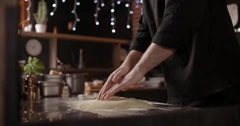 Process of the making the dough for Neapolitan pizza in the pizzeria restaurant Stock Footage 266925139