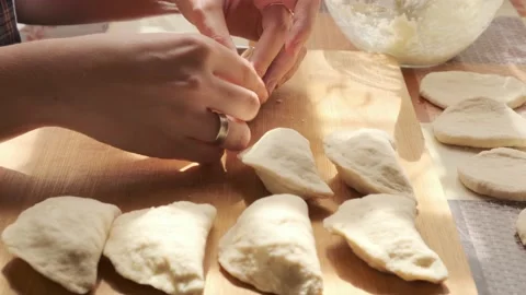 Process of making dumplings. Closeup of preparing traditional dish Stock Footage 140206591