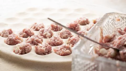 The process of making dumplings with meat, dough with meat Stock Photos