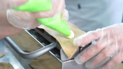 The process of making dumplings. Put the filling and with the help of special Stock Footage 151884777