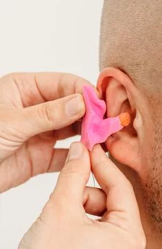 Process of making earplug from an impression of an individual s human ear. Ea 写真素材