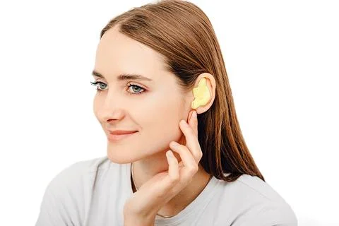 Process of making earplug from an impression of an individual s woman ear. Ea Stock Photos