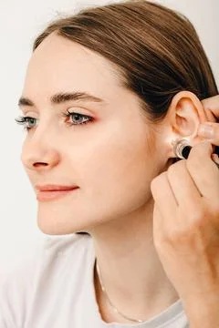 Process of making earplugs from an impression of an individual human ear. Ear Foto stock