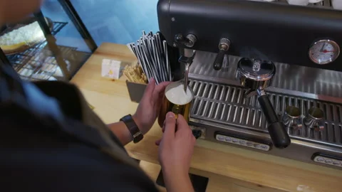 Process of making espresso in a coffee machine. Barista making latte in Stock Footage 137793664