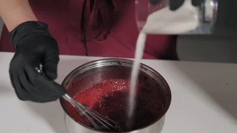 Process of making filling for dessert. Mass of cherry and sugar is mixed Video stock 106705646