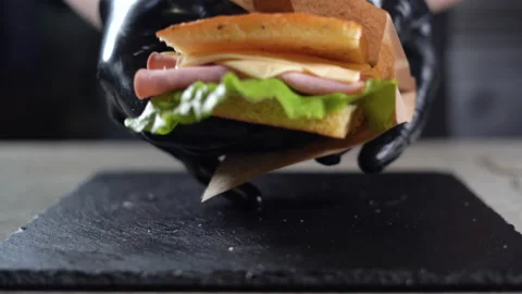 The process of making focaccia with turkey ham in the kitchen. close-up of the Video stock 152698419