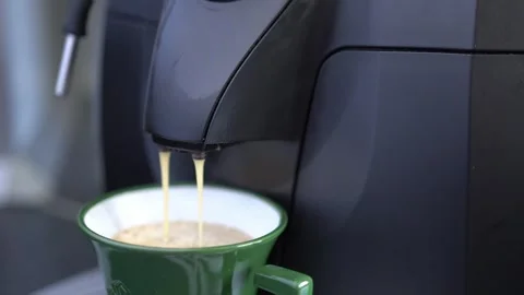 The process of making fresh espresso coffee in a coffee machine Stock Footage 309190312