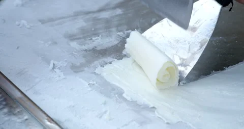 Process of making fried ice-cream. Clip. Thailand stir-fried ice cream rolls at Video stock 277499016