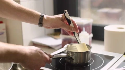 The process of making ganache, a filling for a pistachio croissant. Stock Footage 233296558
