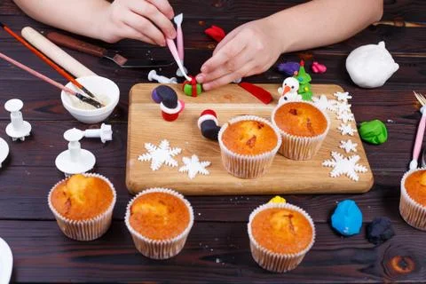 Process of making a gift box cupcake decoration of confectionery Stock Photos