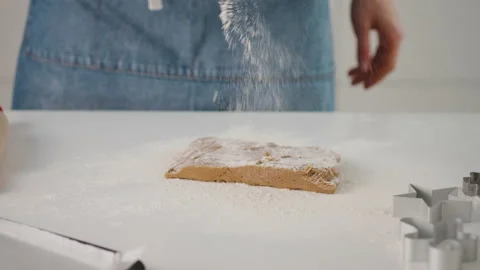 Process of making gingerbread cookies for Christmas. A woman is preparing a Stock Footage 131044103