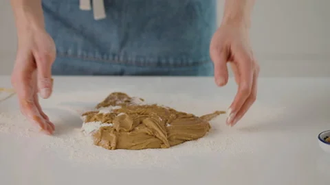 Process of making gingerbread cookies for Christmas. A woman is preparing a Stock Footage 131045287