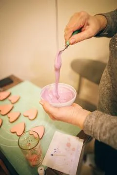 The process of making gingerbread cookies. Glaze coating. Fotos Stock