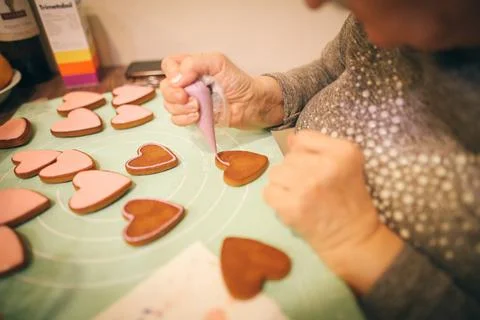 The process of making gingerbread cookies. Glaze coating. Stock-Fotos
