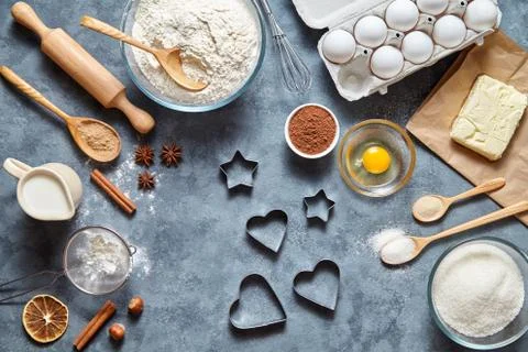 The process of making gingerbread heart on Valentine's Day. Bake sweet cake Stock Photos