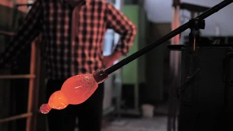 The process of making glass decor with glassblower Stock Footage 272748478