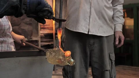 The process of making glass decor with glassblower Stock Footage 273566245