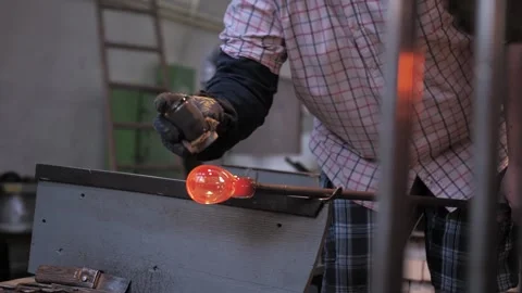 The process of making glass decor with glassblower Stock Footage 273699390
