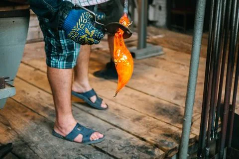 The process of making glass decor with glassblower Stock Photos
