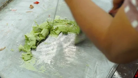 Process of making a handmade fruit icecream on an asian night market Stock Footage 86549184