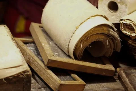 The process of making handmade paper. Traditional papermaking workshop. Stock Photos