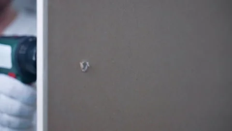 Process of making hole with electric screwdriver Video stock 302280727