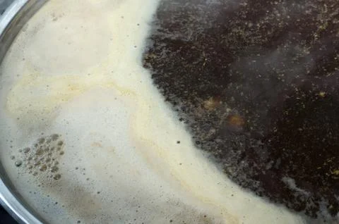 Process of making home beer from malt. Kraft beer from barley and dark malt Stock Photos