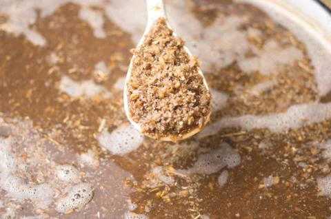 Process of making home beer from malt. Kraft beer from barley and dark malt Stock Photos