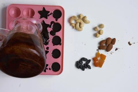 Process of making home made chocolate from carob Stock Photos