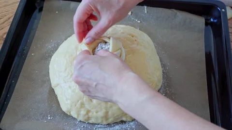 The process making homemade bread. baker covers yeast wheat dough with napkin Stock Footage 186911959