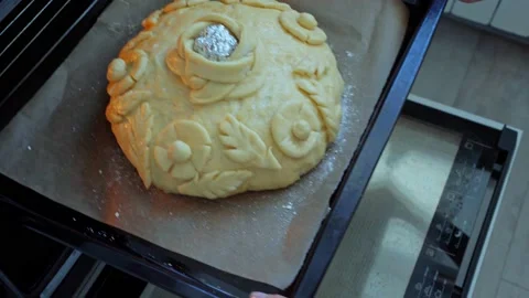 The process making homemade bread. baker puts in oven for baking, making bread Stock Footage 203850316