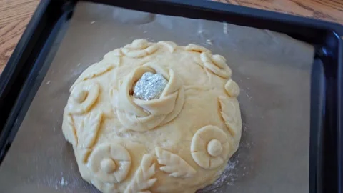 The process making homemade bread loaf. Baker shows bread festive loaf dough Stock Footage 204852918