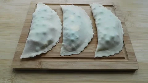 The process of making homemade pies with fish, cheese and vegetables Stock Footage 151246762
