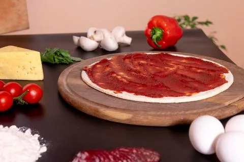 Process of making homemade pizza. In the kitchen Stock Photos