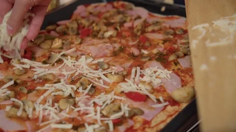 Process of making homemade pizza. Makes cheese. Selective focus Stock Footage 240460792