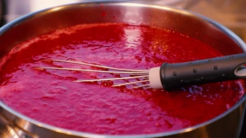 The process of making homemade red berry jam. Stock Footage 231627182