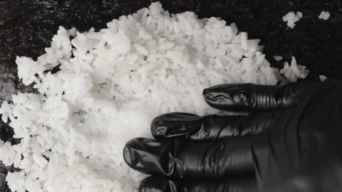 The process of making homemade sushi rolls. Hands in black silicone gloves Stock Footage 278988611