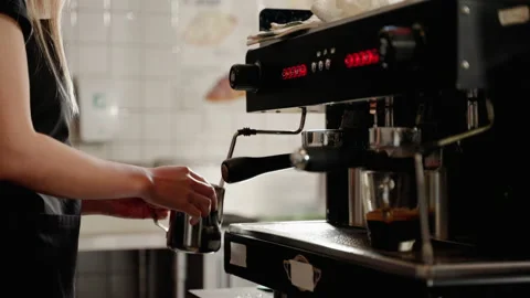 Process of making hot coffee in a coffee machine. business concept Stock Footage 167147729
