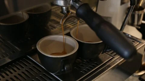 The process of making hot coffee in a coffee machine Stock Footage 293167725